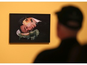 Artist Iain Baxter& checks out his photograph As An Open Faced Sandwich during the Art Gallery of Windsor news conference on May 25, 2017, marking the opening of The Sandwich Project and Charles Pachter: The Cranbrook Years.