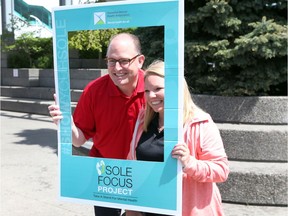 Windsor Mayor Drew Dilkens, left, and Caesars Windsor vice-president Kelly Wolfe-Gregoire help kick off Walking Wednesdays by Showing Sole on May 3, 2017.