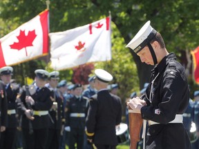A member of Royal Canadian Sea Cadet Corps Agamemnon stands motionless at his post in front of the Battle of the Atlantic Monument during a ceremony at Dieppe Park, Sunday.