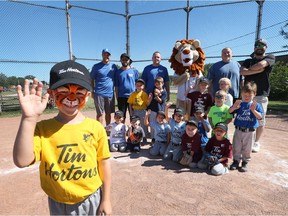 Kyren Purdy, 5, beams as he joins other players in the Riverside Minor Baseball Association's 6th Annual 100 Inning Game on June 24, 2017, with proceeds benefiting Family Respite Services, Windsor Essex.