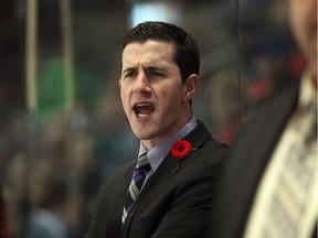 WINDSOR, ON. October 30, 2014 --  Former Windsor Spitfire Paul McFarland, shown here as head coach of the Kingston Frontenacs facing the Windsor Spitfires at WFCU Centre on Wednesday October 29, 2014. McFarland has been named an assistant coach of the Florida Panthers.