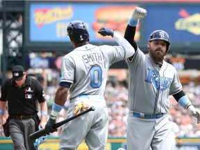Derek Norris #33 of the Tampa Bay Rays celebrates his solo home run to left field with teammate Mallex Smith #0 during the third inning of the game against the Detroit Tigers on June 18, 2017 at Comerica Park.