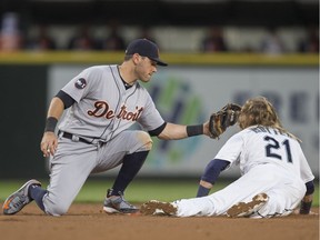Taylor Motter of the Seattle Mariners steals second base before second baseman Ian Kinsler of the Detroit Tigers can apply a tag during the fifth inning of a game at Safeco Field on June 19, 2017 in Seattle, Washington.