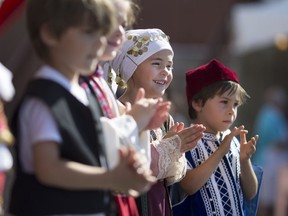 The Terpsichorean Dance Group, consisting of boys and girls aged four to eight, perform traditional Greek dance at the Greek Village as part of the Carrousel of Nations, Sunday, June 18, 2017.