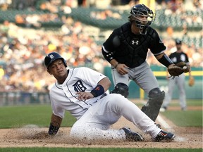 Detroit's Miguel Cabrera slides past home plate after being tagged out by Chicago catcher Kevan Smith during the third inning at Comerica Park on June 2, 2017 in Detroit. Cabrera attempted to score from second base on a single by Victor Martinez. The Tigers defeated the White Sox 15-5.