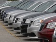 (file) 2011 Consumer Reports says the Dodge Grand Caravan and Charger have shown improvements in quality and sales. Here a row of 2011 Grand Caravans is shown at the Pinnacle Chrysler dealership Tuesday June 21, 2011, in Windsor, Ont.