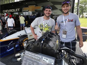 Gage Rivait, left, and Ian Macdonald, both 24, of Windsor, hang out in the fan zone at the Detroit Grand Prix on Sunday, June 4, 2017 in Detroit.
