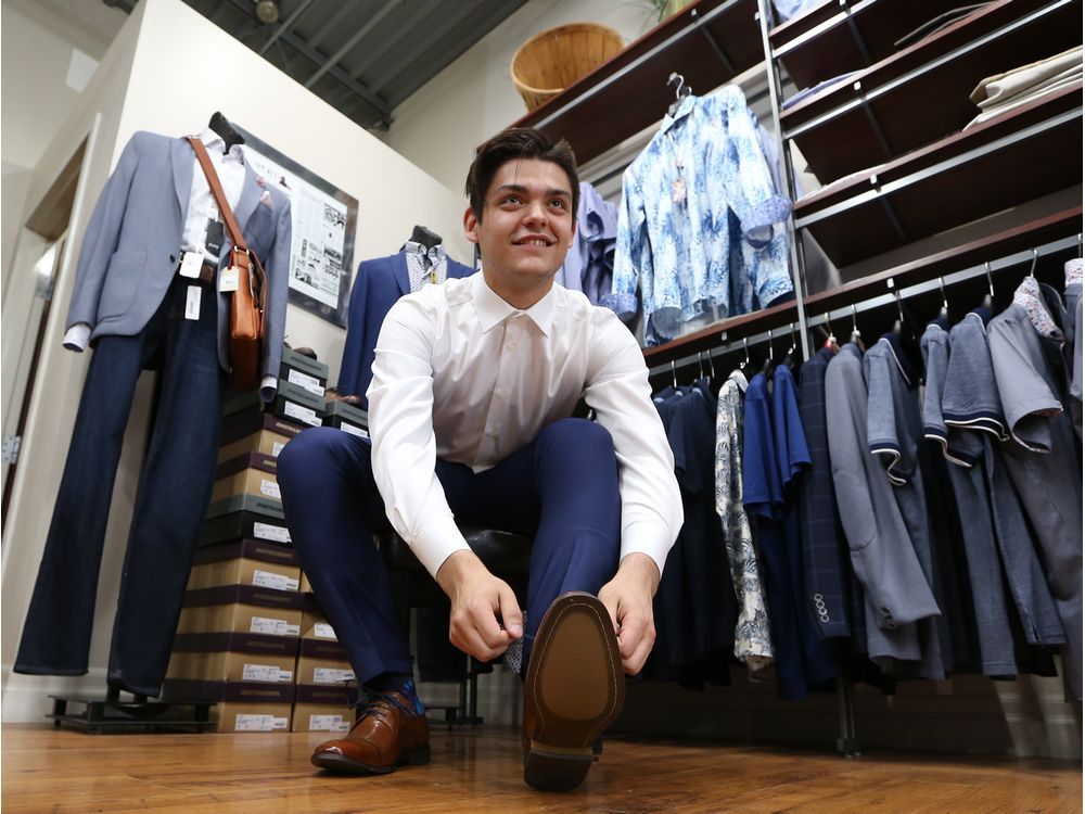 Spits' Michael DiPietro suiting up for the draft at a hometown shop