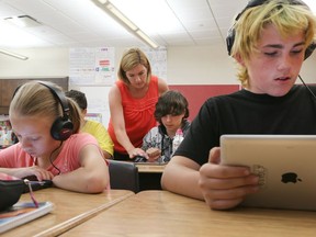 Begley Public School teacher Danielle Moonie working with her Grade 4 students, June 20, 2017.