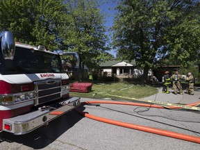Fire crews work at the scene of a house fire at 3016 Virginia Park Avenue on June 7, 2017. There were no injuries reported.