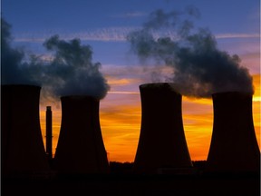 Power plant at sunset. Photo by Getty Images.