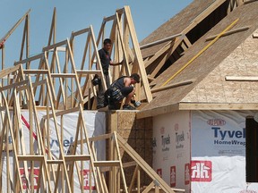 Framers are shown working on a new home on Ryan Avenue in Lakeshore on June 8, 2017. Housing starts are up in the Essex County municipality.