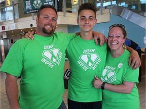 Kaidyn Blair, centre, an organ transplant recipient, walked from his hometown of Essex to Windsor Regional Hospital Metropolitan Campus on June 10, 2017, along with family, friends and supporters. The goal was to raise funds and awareness for Organ/Tissue Donation and W.E. Care for Kids. Kaidyn is shown with his parents Jeremy and Tammy Blair after the long walk