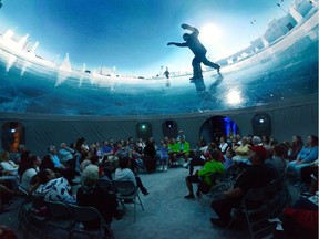 An audience watches a 360-degree film about Canada at the SESQUI Dome in London on June 29, 2017. The travelling cinematic experience will come to Windsor's riverfront next week.