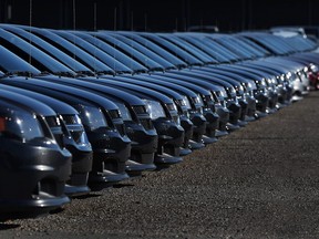 A line of Dodge Grand Caravan minivans is seen at the Motor City Chrysler dealership in Windsor in February.