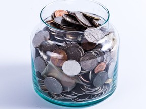 Money jar. Minimum wage. Photo by Getty Images.