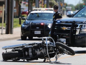 A motorcycle involved in a collision with a pedestrian on Tecumseh Rd. E. west of Shawnee Rd. in Tecumseh, ON. is shown on Tuesday, June 27, 2017.