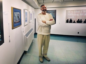 Charles Pachter, Canadian and raconteur, is coming to Windsor for a fundraising show on Thursday, June 26, 2017 at the Windsor Jewish Community Centre. His work is currently on display at the centre. Jay Katz, executive director of the WJCC is shown with some of the pieces on June 26, 2017.