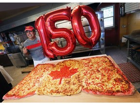 Canada Pizza

WINDSOR, ON. JUNE 28, 2017. --  Bob Abumeeiz, owner of Arcata Pizzeria on Dougall Ave. in Windsor, ON. made a huge Canada flag themed pizza on Wednesday, June 28, 2017 and donated it to the Downtown Mission. He decided to make the massive pie to celebrate Canada's 150th birthday. Abumeeiz poses with the cooked pizza. (DAN JANISSE/The Windsor Star)
Dan Janisse