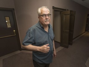 Bob Williams, executive director of the Windsor Pride Community Education and Resource Centre, looks at a potential commercial rental  unit at 443 Ouellette Ave., while facing eviction from the Pelissier parking garage, Friday, June 16, 2017.