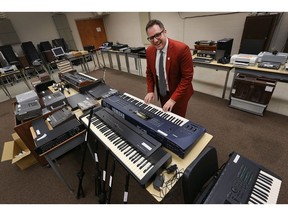 U of W school of music
Vincent Georgie, a professor at the University of Windsor poses on June 27, 2017, with some of the musical instruments and accessories from the school of music that are up for sale. The department is moving downtown into the former Armouries in September.