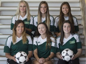 St. Clair soccer recruits (clockwise from top-left) Blair Boismier, 18, Alayna Banks, 18, Ally Schooley, 17, Ashley Benjamin, 17, Jaclyn French, 17, and Carly Jolicoeur, 17, pose for a photo at the St. Clair College SportsPlex on June 7, 2017.