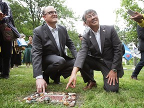 Drew Dilkens, Mayor of Windsor, left, and Tsuneo Suzuki, Mayor of Fujisawa, Japan are shown during a tree dedication ceremony at the Jackson Park in Windsor, ON. on Monday, June 26, 2017.