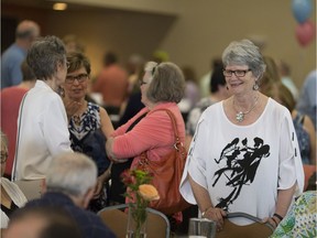 Family Respite Services Windsor-Essex executive director, Catharine Shanahan, mingles with guests at St. Angela Merici Hall during the 18th annual Walk on Erie,  Monday, June 19, 2017.