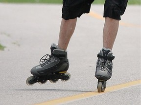 An inline skater makes his way along the Ganatchio Trail in May 2007.