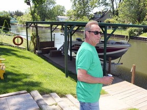 Jack Baynham of Bertha Street, seen here on June 1, 2017, has built a boat lift structure on his property which backs onto Little River.