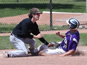 Riverside third baseman Ardi Kelmendi tags out A.N. Myer baserunner Rob Carriero during OFSAA baseball action at Lacasse Park in Tecumseh on June 1, 2017. Riverside defeated Myer 4-1.