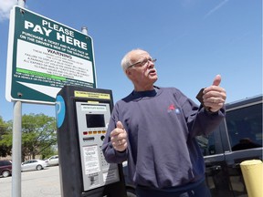A new parking system where vehicle owners must punch in their licence plate numbers to purchase a parking pass, has many lot users upset, including John Moffat, who calls the new procedure “absurd.”