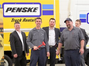 Penske Truck Leasing staff members Keyr O'Hara, left, mechanic Brian Sterling, Matthew Purchase, mechanic Steve Lilley and Mark Rietze prepare for the grand opening of Penske's new 10,400 sq. ft. facility on Fourth Street in Windsor June 9, 2017.