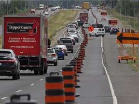 Vehicles move east along E.C. Row Expressway between Howard Avenue and Walker Road on  June 15, 2017.