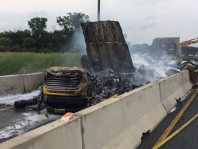 Ontario Provincial Police closed a section of Highway 401 in Chatham-Kent on Thursday evening following a fiery crash involving a transport truck on July 13, 2017. OPP Handout.