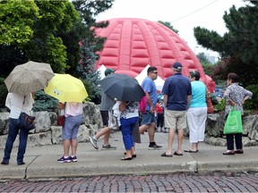 In a line making several loops, hundreds waited to see the popular 20-minute film Horizon, near Dieppe Park on July 10, 2017.  Attendees waited up to two hours to view the unique cinematic experience.