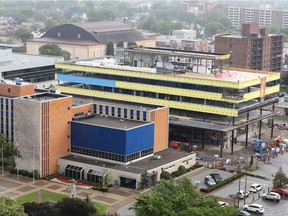 Windsor's new city hall is taking shape beside the old city hall, left, in downtown Windsor on Tuesday, July 11, 2017.