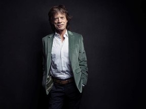 FILE - In this Nov. 14, 2016 file photo, Mick Jagger of the Rolling Stones poses for a portrait in New York. Jagger released the songs and music videos Thursday, July 27, 2017, for tunes titled, ‚ÄúGotta Get a Grip‚Äù and ‚ÄúEngland Lost.‚Äù (Photo by Victoria Will/Invision/AP)