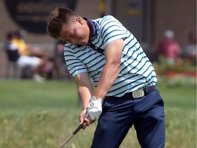 Using a borrowed driver, Beach Grove's Curtis Hughes lets it fly on 17th at Ambassador Golf Club during Ontario Men's Amateur Golf Tournament on Friday. Hughes' own driver broke during the final round.