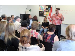 Ron Dunn of Downtown Mission stood tall while answering questions from area residents during DWCC meeting at YMCA July 24, 2017.