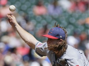 Starting pitcher Mike Clevinger of the Cleveland Indians delivers against the Detroit Tigers during the fifth inning at Comerica Park on July 2, 2017 in Detroit. Clevinger recorded his fourth win in the Indians 11-8 victory over the Tigers.