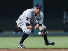 Detroit's Ian Kinsler fields a ground ball before throwing out Francisco Lindor of the Cleveland Indians at first base during the first inning at Progressive Field on July 9, 2017 in Cleveland, Ohio.