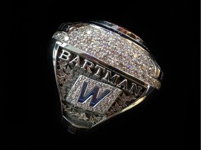 This photo provided by the Chicago Cubs baseball team shows a 2016 World Series championship ring the team announced on July 31, 2017, they were giving to Steve Bartman, the fan remembered for deflecting a foul ball that appeared destined to land in left fielder Moises Alou's glove with Chicago five outs from the World Series in 2003.