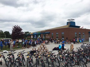 Kids, volunteers, and Windsor police officers gather at the Safety Village for the closing ceremonies of Camp Brombal on July 13, 2017.