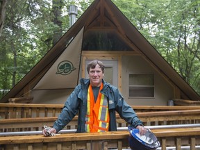 Dan Dufour, co-ordinator for a new camping project, stands in front of a new oTENTik structure at Point Pelee National Park July 10, 2017.