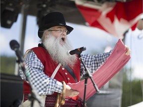 Shaymus Gunn gives a proclamation for Colchester's 225th anniversary at the Get Your Red and White On at Colchester Park, July 29, 2017. Celebrants also toasted a much younger Canada and its 150th birthday.