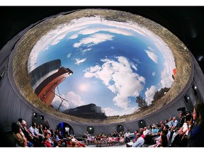 A 360-degree film screened inside a cinematic red dome is set up on Windsor's riverfront. The 22 minute film, called Horizon, features geography, art and people from every province and territory. Local dignitaries and city summer camp students had a chance to check out the production. They are shown taking in the show on Friday, July 7, 2017.