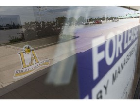 A 'for lease' sign sits in the window of a former weight loss business at the Dougall Plaza on Dougall Avenue on July 20, 2017.