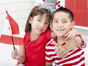 Siblings celebrate Canada Day in this file photo.