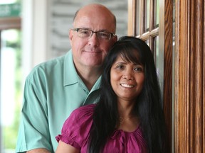 Mike Schlater, the CEO of Domino's Pizza of Canada, and his wife Lilibeth are shown in their Leamington home on July 20, 2017.